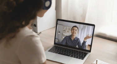 Child Studying On Computer With Onlne Tutor